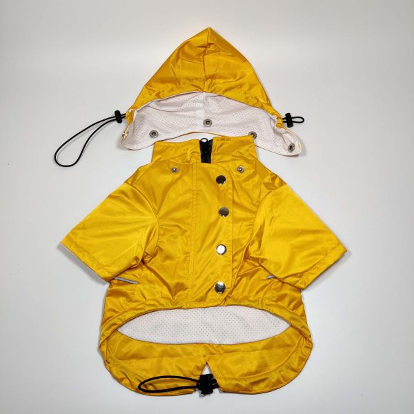 Dog A La Mode brand new fully weatherproof yellow raincoat with a breathable mesh lining and a detachable hood, shown from the front view with the Dog A La Mode logo