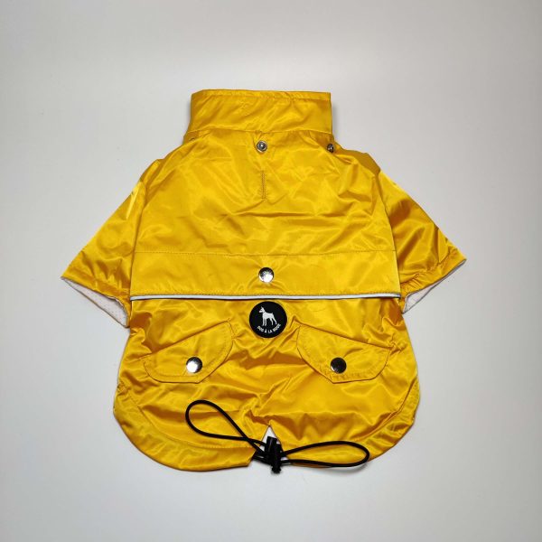 The back view of the brand new Dog A La Mode fully waterproof yellow raincoat with a breathable mesh lining and drawstrings without the detachable hood with the Dog A La Mode branded logo