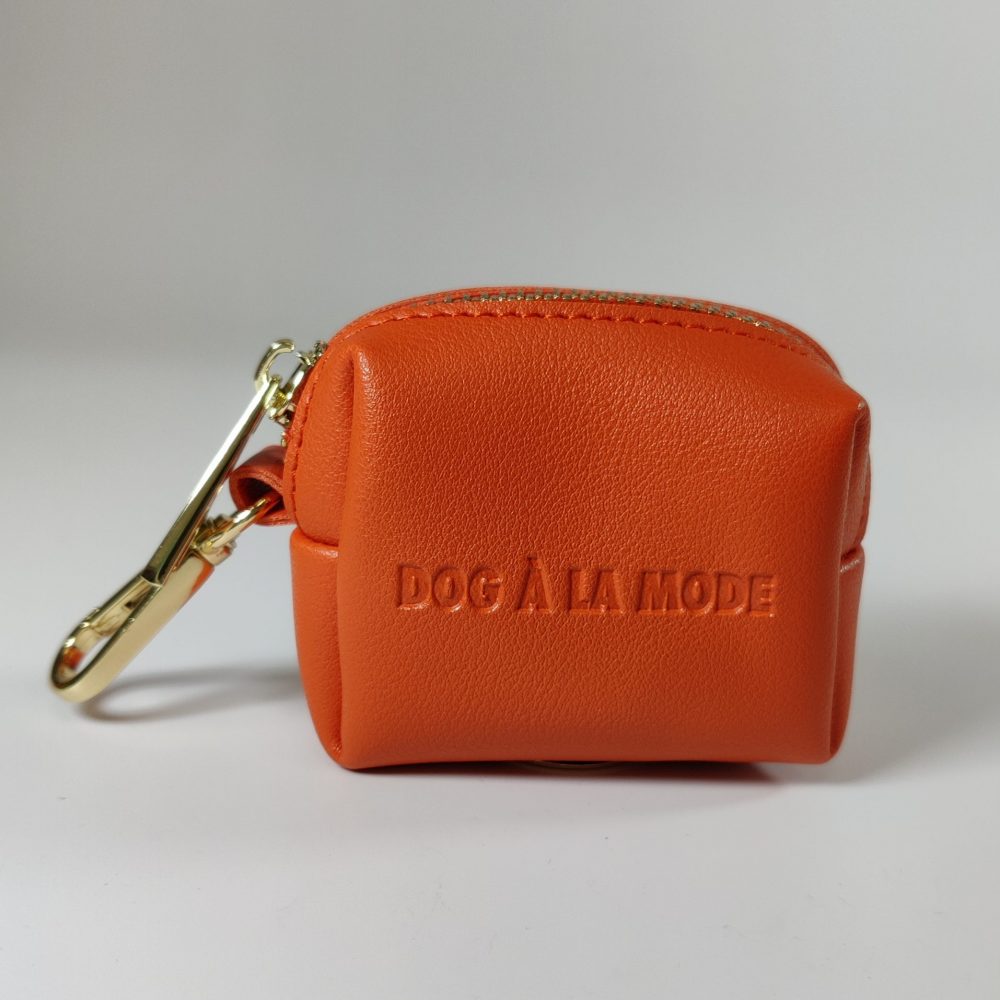 Dog A La Mode Le Classique orange dog poop bags holder front view made out of high quality vegan leather