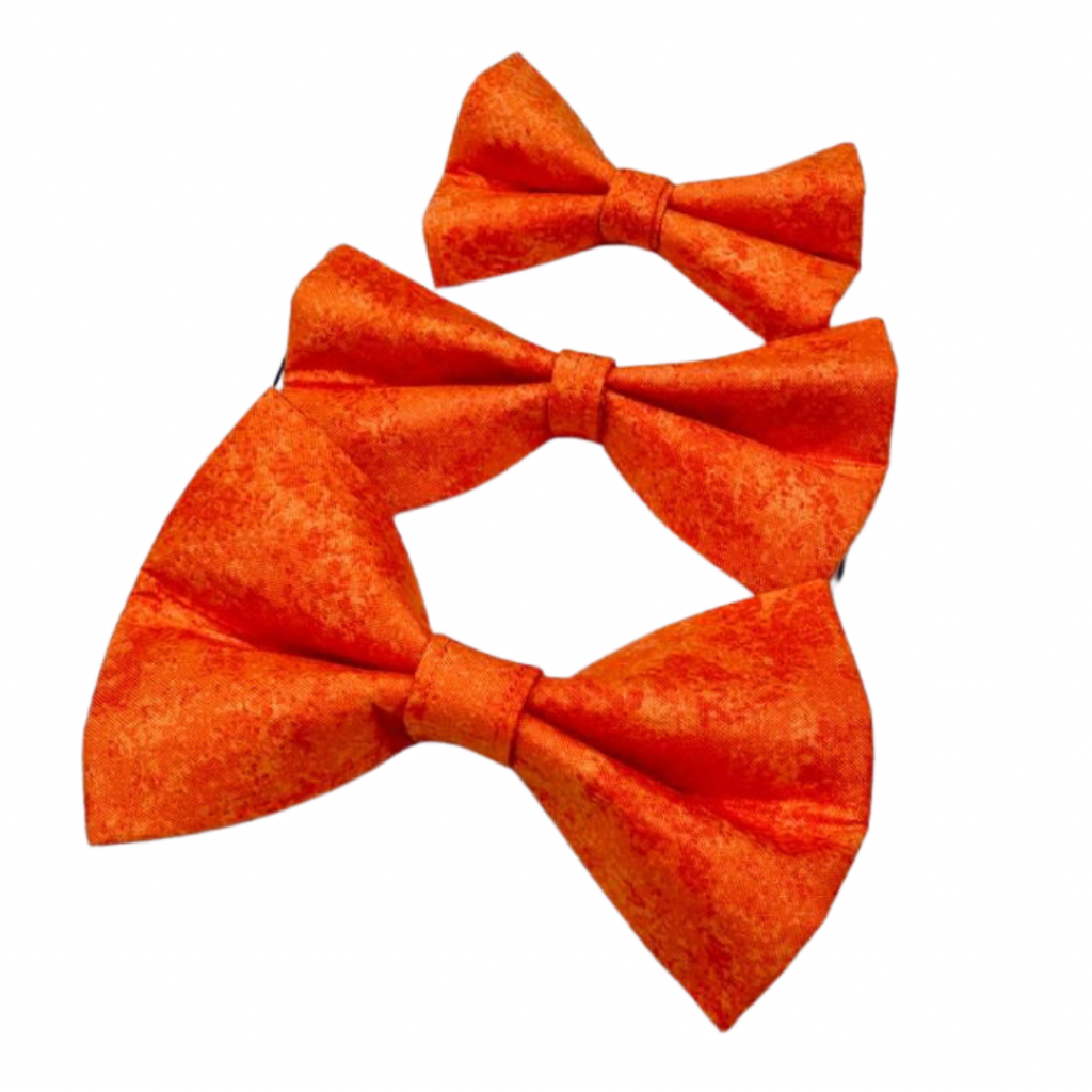 Dog A La Mode orange dog bow ties in three different sizes: small, medium and large